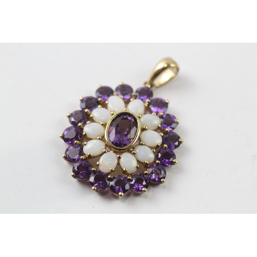 491 - 9ct gold amethyst and opal pendant (3.3g)