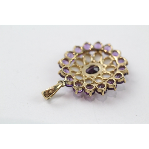 491 - 9ct gold amethyst and opal pendant (3.3g)