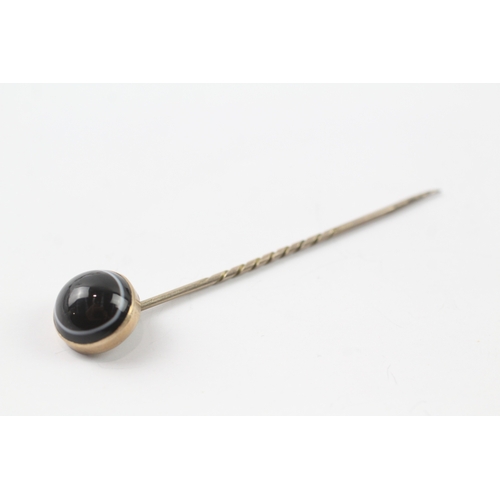 492 - 6ct gold antique bullseye agate stick pin (2.6g)