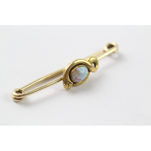 493 - 15ct gold opal set snake design brooch (4.5g)