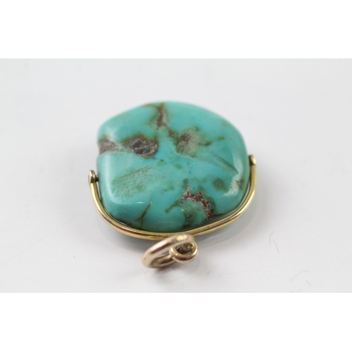 498 - 9ct gold turquoise swivel pendant (7.6g)