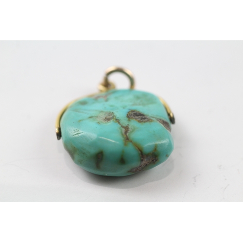 498 - 9ct gold turquoise swivel pendant (7.6g)