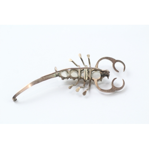 503 - 9ct gold moonstone scorpion brooch (2.3g)