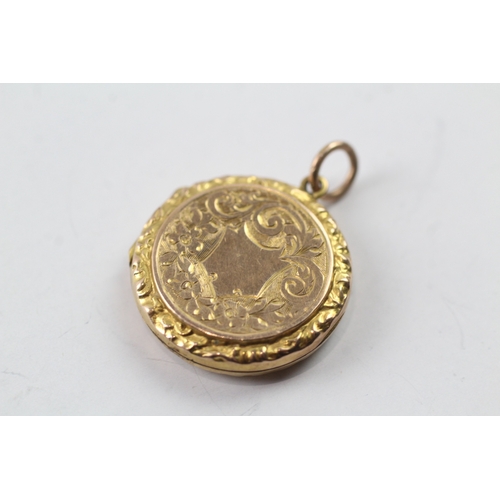 511 - 9ct gold back and front round locket (3.8g)