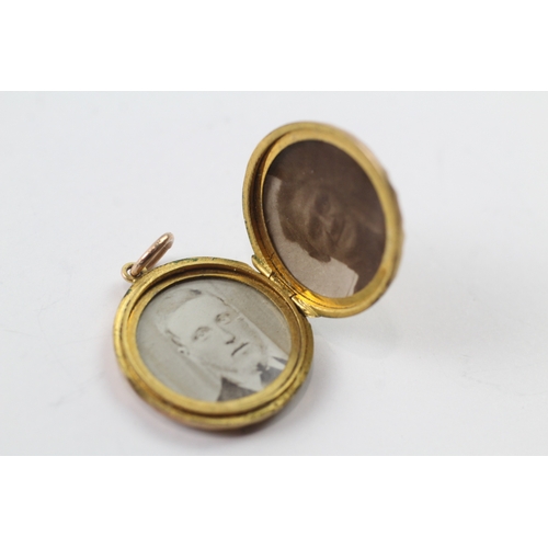 511 - 9ct gold back and front round locket (3.8g)