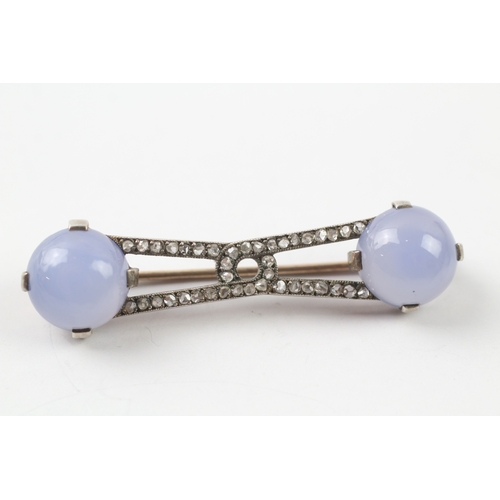 52 - 9ct gold and silver diamond and chalcedony bar brooch (5.7g)