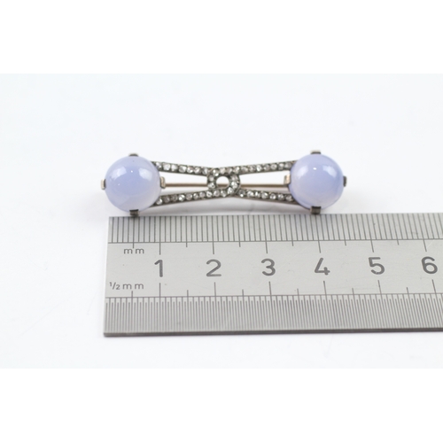 52 - 9ct gold and silver diamond and chalcedony bar brooch (5.7g)