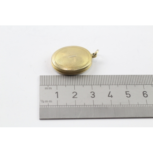 522 - 9ct gold back and front locket (7g)