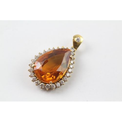 547 - 14ct gold citrine and cubic zirconia pendant (7.4g)