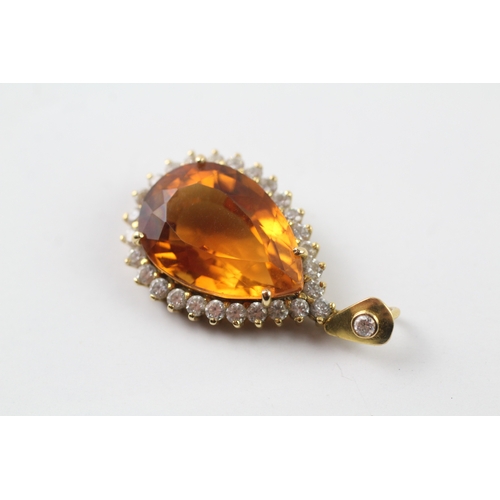 547 - 14ct gold citrine and cubic zirconia pendant (7.4g)