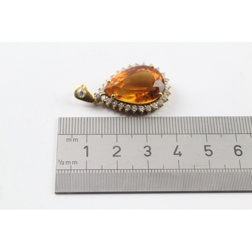 547 - 14ct gold citrine and cubic zirconia pendant (7.4g)