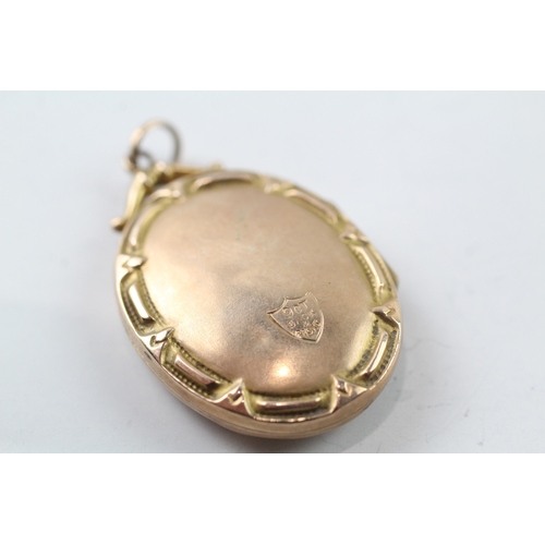 549 - 9ct gold back and front locket (4.4g)