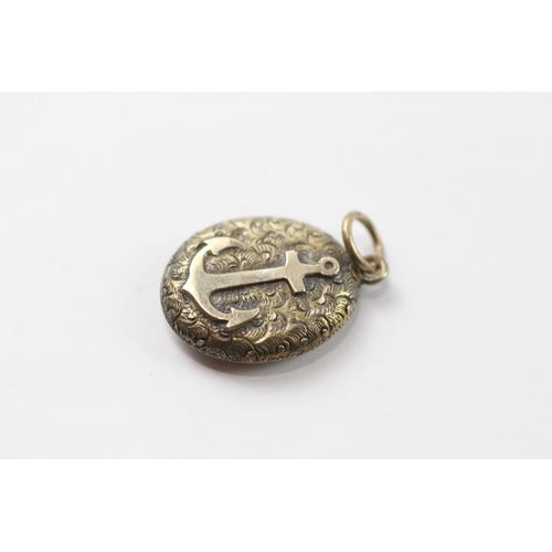 567 - 18ct gold mourning locket with anchor design (1.6g)