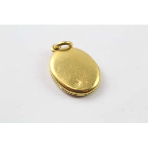 569 - 18ct gold vintage diamond locket (6.1g)