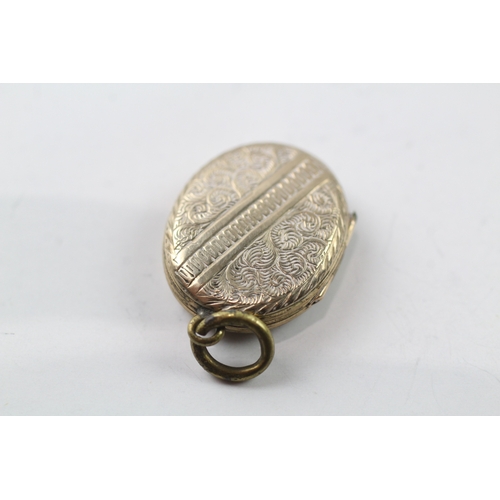 570 - 9ct gold back and front locket (4.6g)