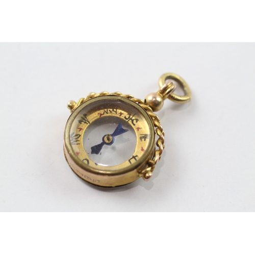 571 - 9ct gold antique compass fob (3.7g)