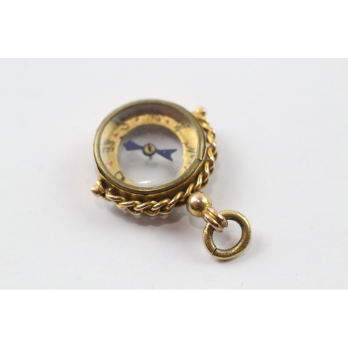 571 - 9ct gold antique compass fob (3.7g)