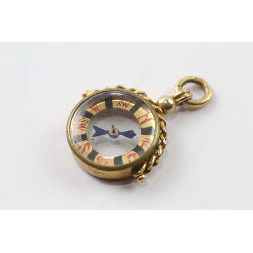 571 - 9ct gold antique compass fob (3.7g)