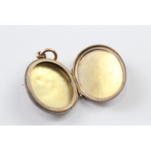 62 - 15ct gold back and front locket (6.7g)