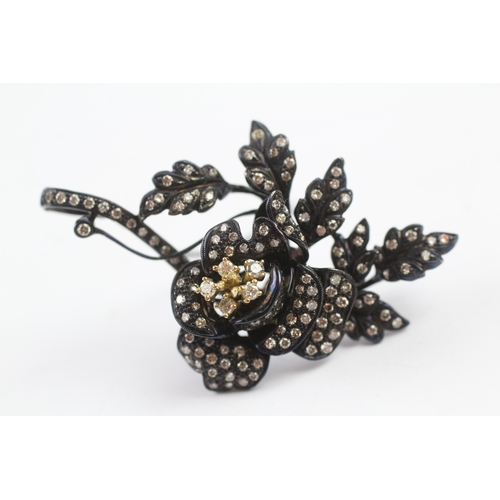 66 - 18ct gold diamond floral brooch (15.9g)