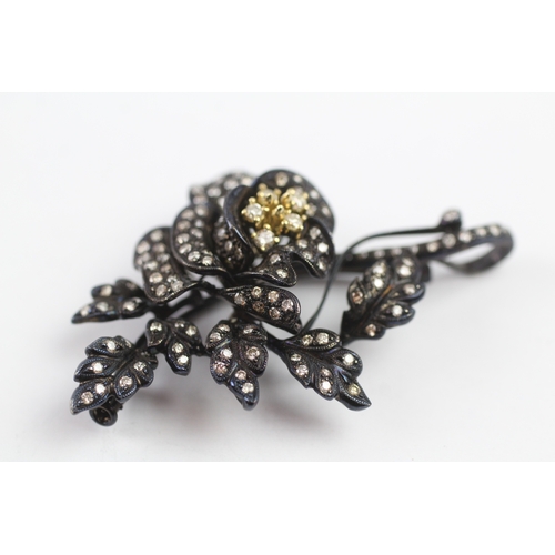 66 - 18ct gold diamond floral brooch (15.9g)