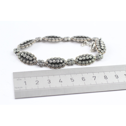 68 - 9ct gold and silver vintage marcasite bracelet (27.9g)