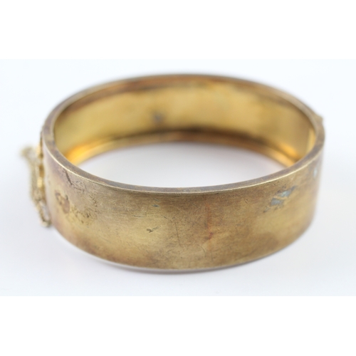 72 - 18ct gold ornate bangle (29.2g)