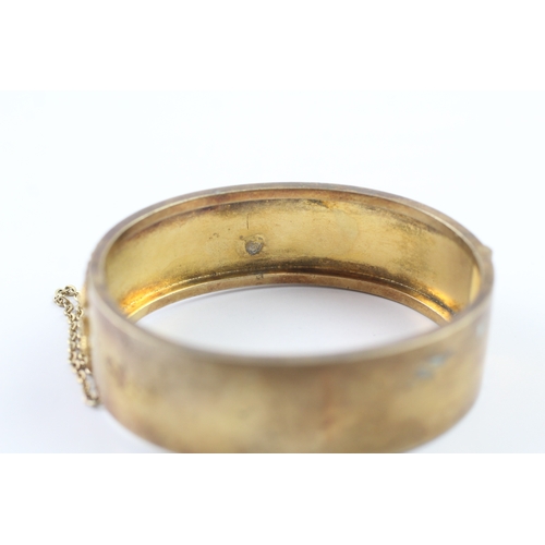 72 - 18ct gold ornate bangle (29.2g)