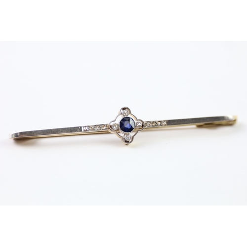 79 - 15ct gold diamond and sapphire bar brooch (6.1g)