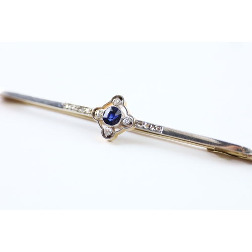 79 - 15ct gold diamond and sapphire bar brooch (6.1g)