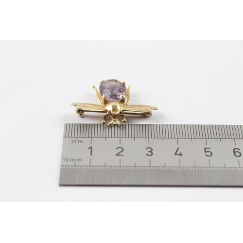 95 - 14ct gold amethyst and ruby set bug brooch (5.2g)