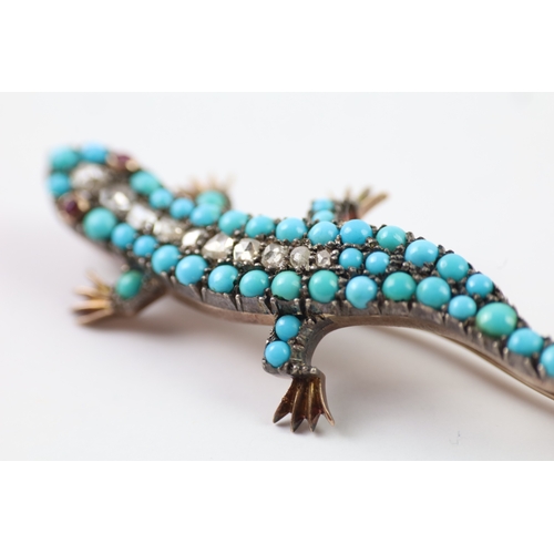 99 - 9ct gold and silver lizard brooch set with diamond, turquoise and ruby (7.8g)