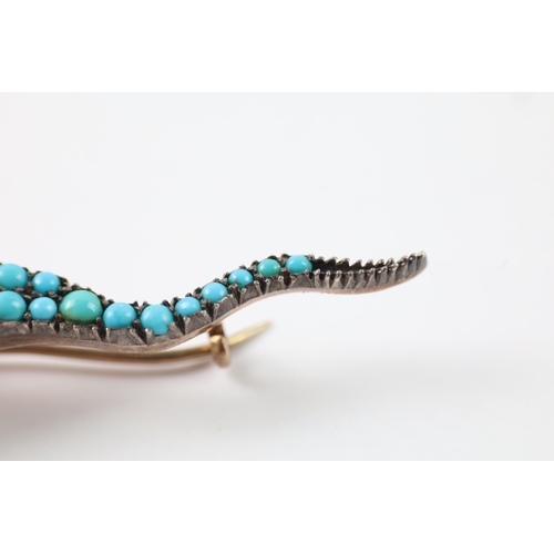 99 - 9ct gold and silver lizard brooch set with diamond, turquoise and ruby (7.8g)