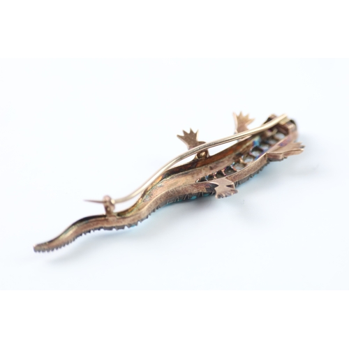 99 - 9ct gold and silver lizard brooch set with diamond, turquoise and ruby (7.8g)