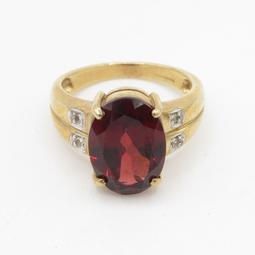 152 - 9ct gold garnet and white gemstone cocktail ring (6.3g) Size N 1/2