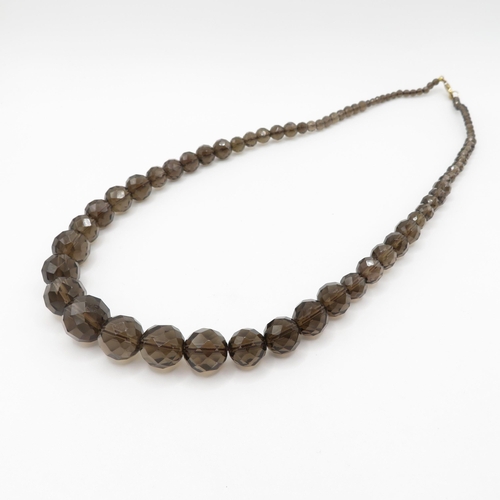 156 - 9ct gold clasped smoky quartz bead necklace by Whitney Kelly (72.6g)