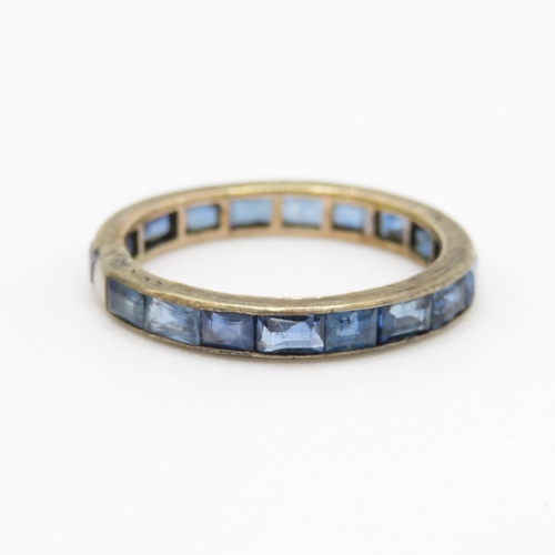 161 - 9ct gold sapphire eternity ring (1.9g) Size M 1/2