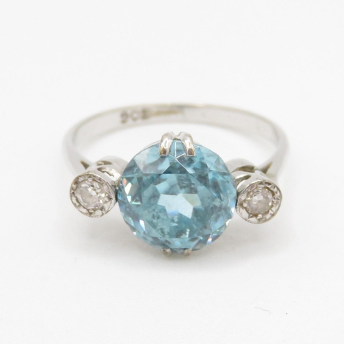 162 - 9ct white gold diamond and blue zircon trilogy dress ring (2.7g) Size N