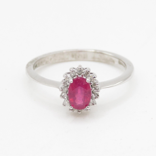 173 - 9ct gold ruby and diamond halo ring (2.2g) Size O