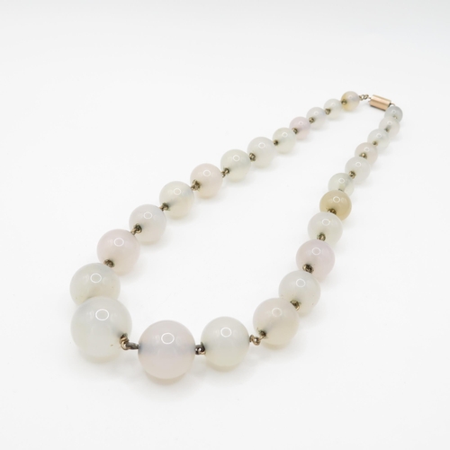 181 - 9ct gold clasped antique chalcedony bead necklace (72.5g)