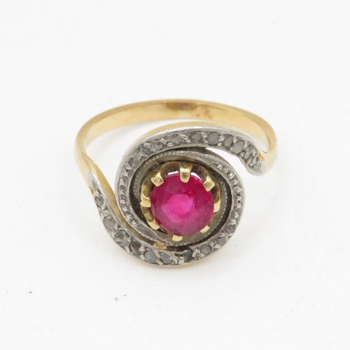 218 - 14ct gold diamond and ruby dress ring (3.6g) Size M