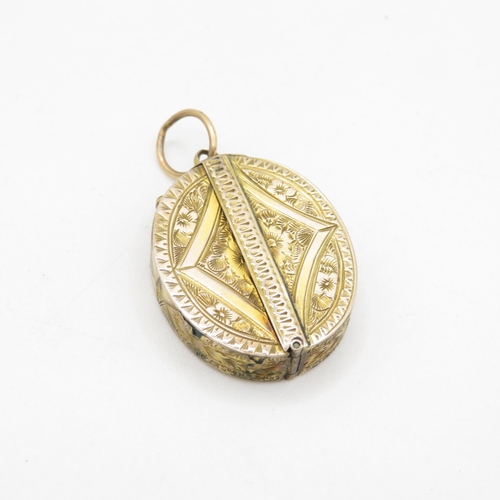 309 - 9ct gold back and front Victorian locket (7.8g)