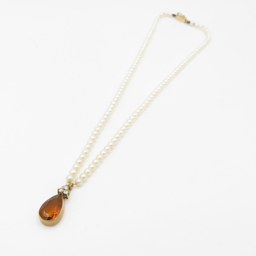 412 - 14ct gold pearl necklace with a diamond and citrine pendant (7.3g)