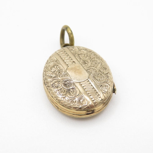 570 - 9ct gold back and front locket (4.6g)