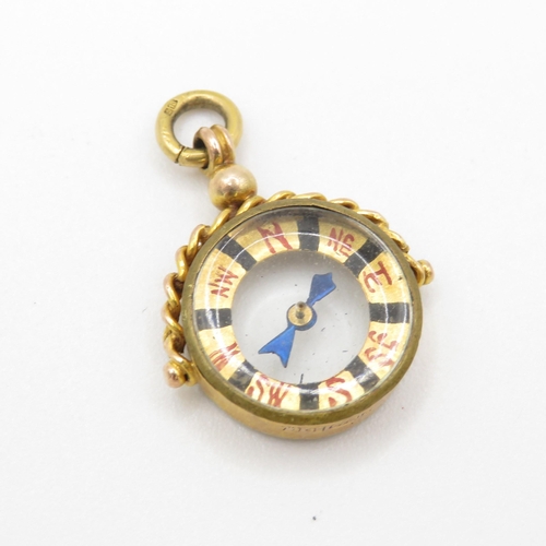 571 - 9ct gold antique compass fob (3.7g)