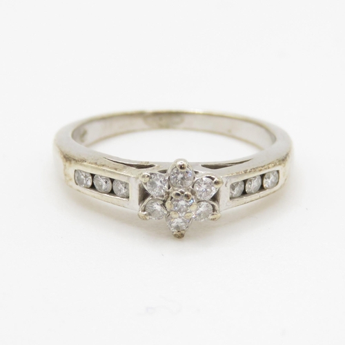 255 - 9ct gold diamond set dress ring (2.4g) Size I 1/2