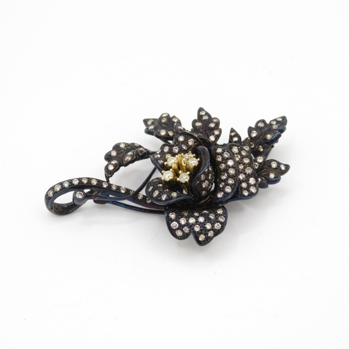 66 - 18ct gold diamond floral brooch (15.9g)