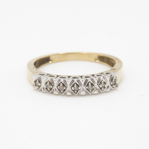 103 - 9ct gold diamond row ring (2.1g) Size P