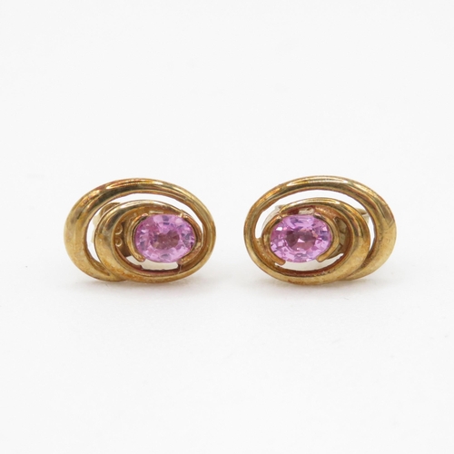 106 - 9ct gold pink sapphire stud earrings (1.4g)