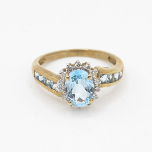 110 - 9ct gold blue topaz & diamond dress ring (2.7g) Size N 1/2